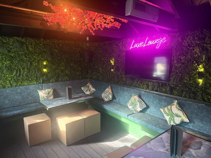 The private Luxe Lounge with karaoke booth at Fizzy Moon