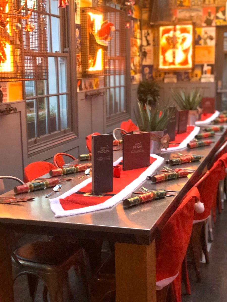 The main bar dressed for Christmas with santa table runners