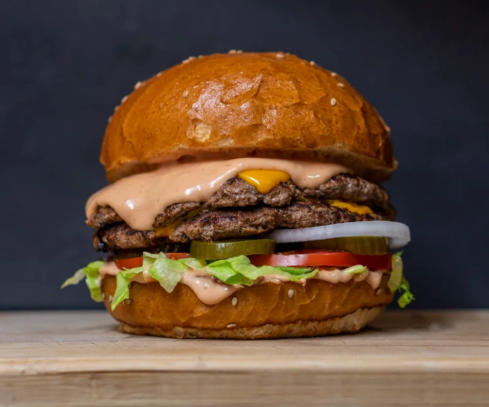 Gourmet burger from Fizzy Moon Brewhouse fire-grilled food menu